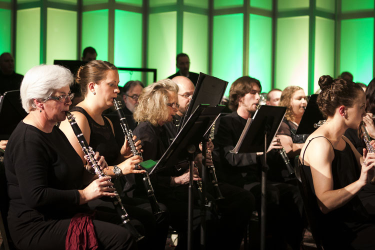 State Line Wind Symphony woodwind section performing on stage