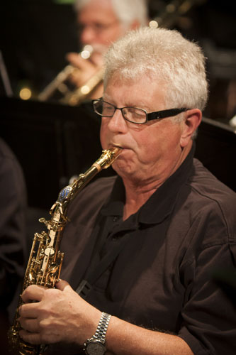 Saxophone player immersed in a performance