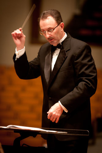 Mark Collins, co-founder and co-director of the State Line Wind Symphony